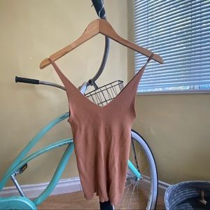 Stretch form fitting neutral camisole | H&M